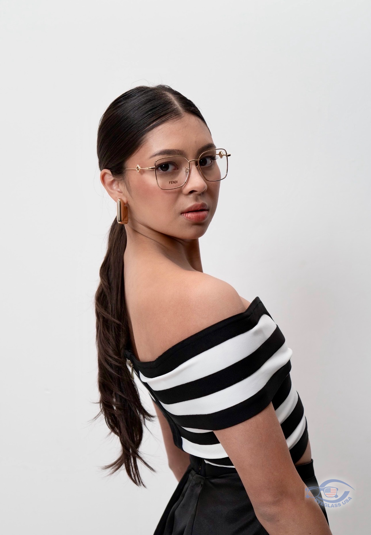 Customer wearing gold Fendi prescription frames